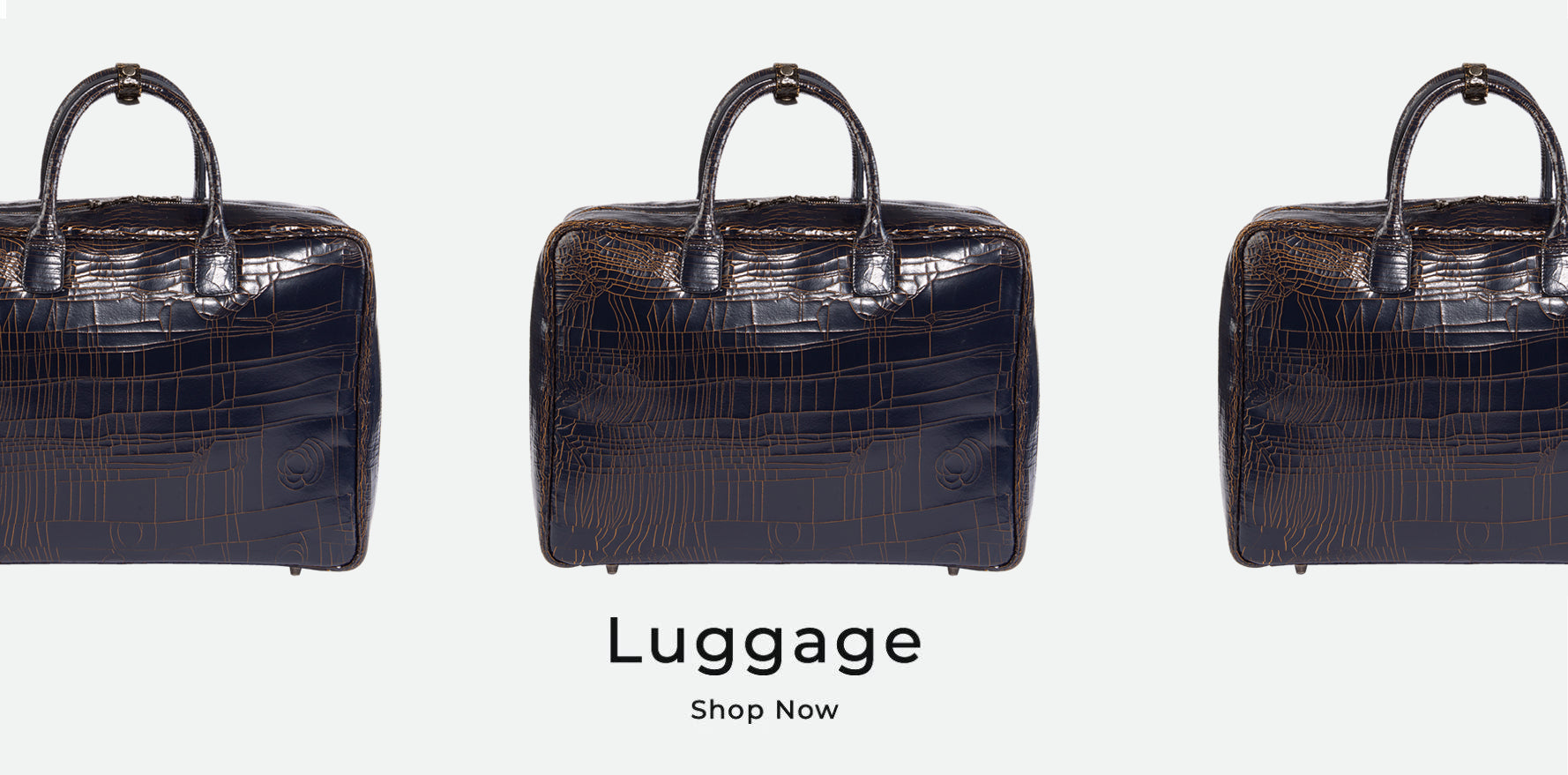 three identical leather bags