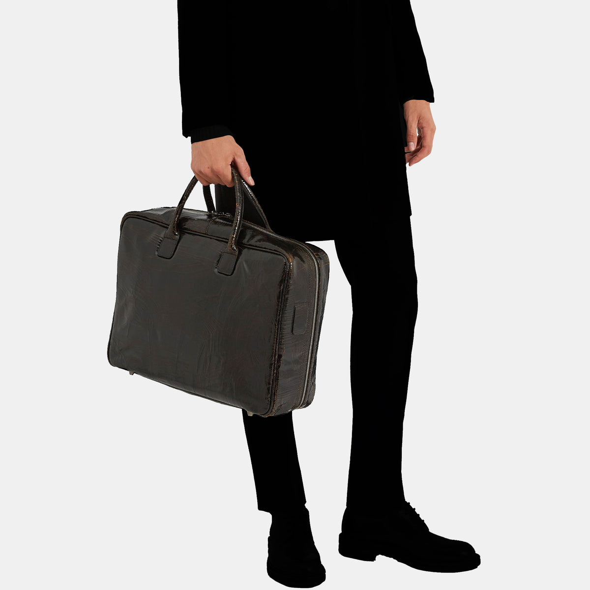 Luxury black leather Midi Benny Bag Luggage by Marc Marmel featuring sturdy handles and sleek design for travel.