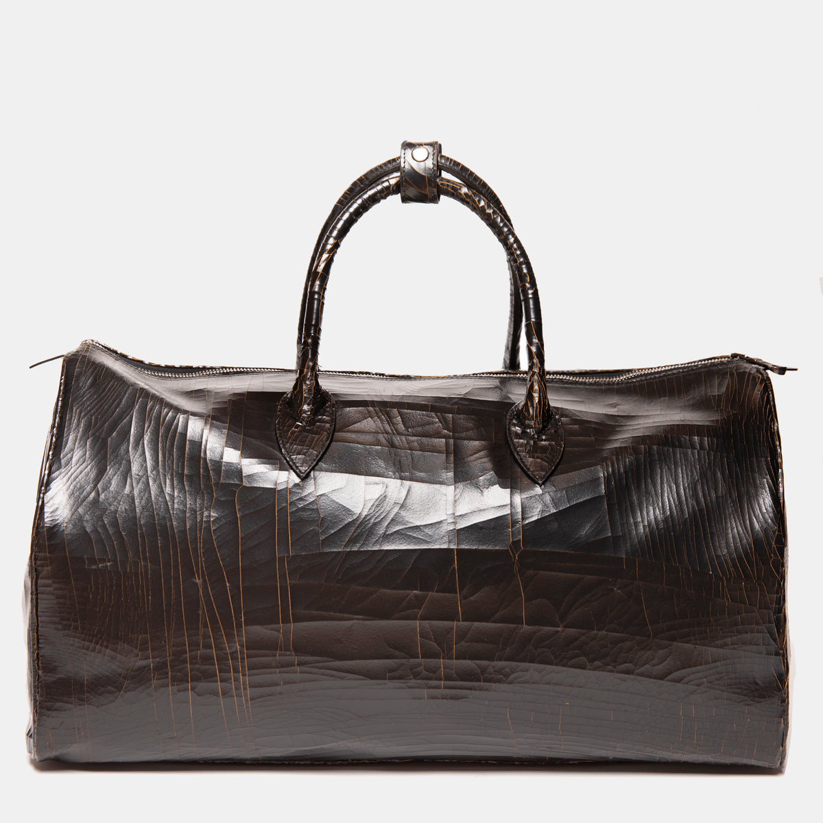 Marc Marmel Roberts Carryall bag in black leather, showing spacious interior and sturdy handles on a neutral background.