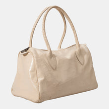 Luxury leather sustainable silk doctor shaped handbag